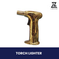 Gold refillable butane torch lighter with safety lock and base.